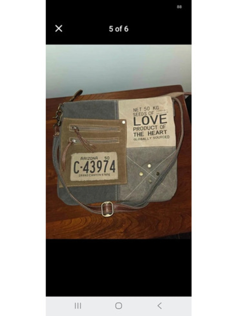 Myra "Seeds of Love" upcycled canvas and leather crossbody bag